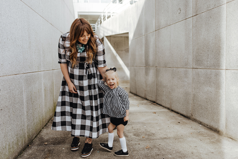 Atlanta Influencer-Blogger Photographer, mom and daughter dressed in black and white checkered patterns