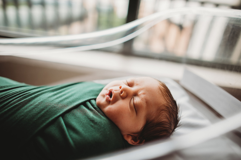 Atlanta Newborn Photographer, newborn baby resting peacefully in hospital bassinet