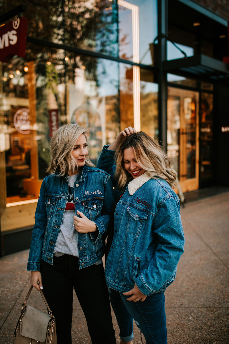 Atlanta Blogger-Influencer Photographer, two women in jean jackets smile before downtown shops