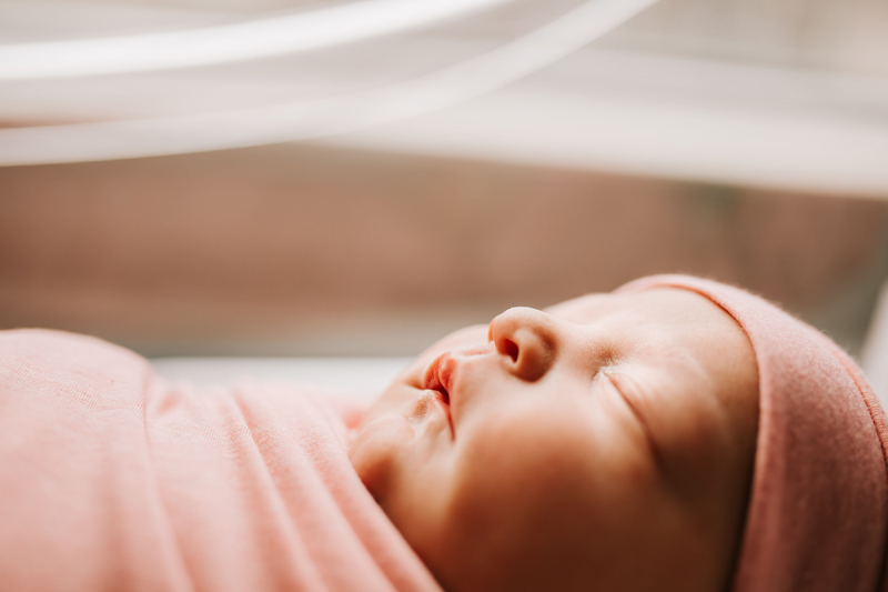 Atlanta Newborn Photographer, close up of newborn as baby lays sleeping peacefully